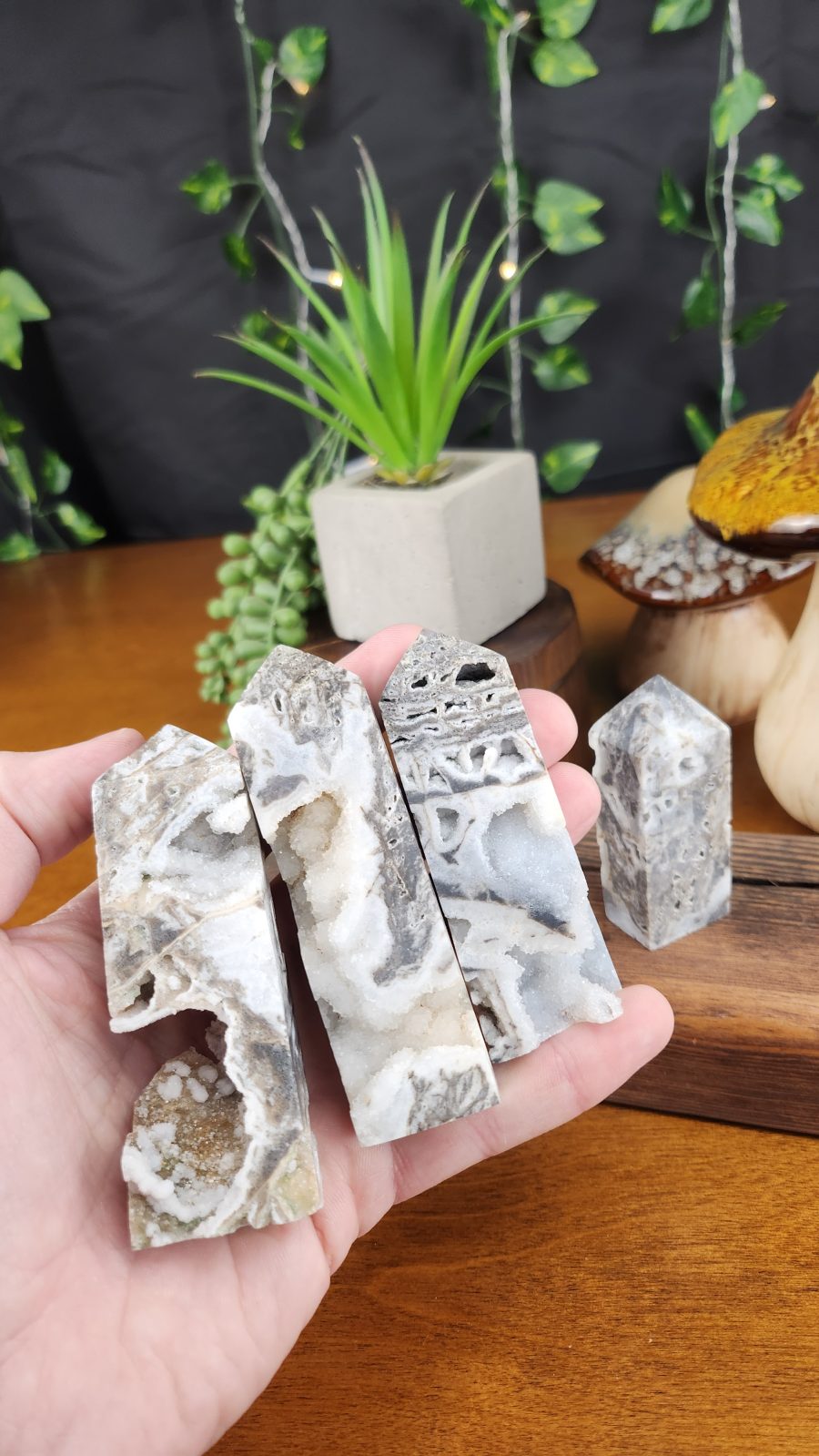 Sphalerite Druzy Towers crystals shown in hand for scale.